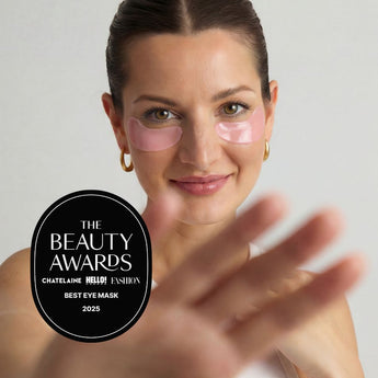 Woman wearing pink eye masks with a 'Beauty Awards' badge in the corner.