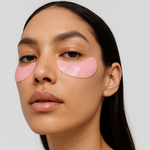 Model wearing Pink Perspective Hydrogel Eye Therapy cooling and de-puffing eye patches